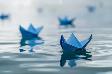 A peaceful scene of multiple blue origami boats on calm water reflecting tranquility and simplicity