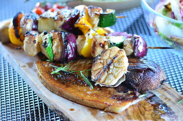 beautiful background of close-up of grilled food on a wooden board