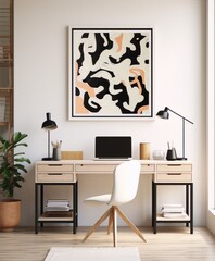 Black and white abstract painting in a minimalist home office with a wooden desk, a white chair, and a potted plant.