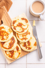 arepas con queso, the traditional Colombian cornmeal pancakes with butter