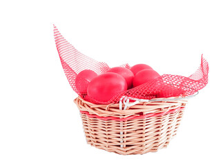 eggs red in a basket easter background