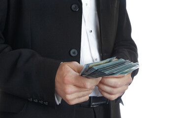 Business man holding money on white background