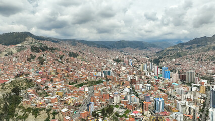 La Paz, Bolivia, aerial view flying over the dense, urban cityscape