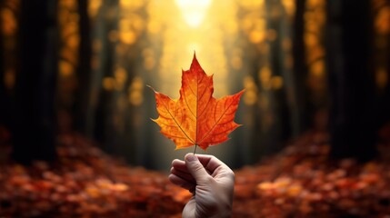 Autumn's touch: fingers gently hold a radiant red leaf, a close-up spectacle against the backdrop of the forest. - Powered by Adobe