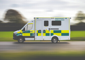 British Ambulance Rushing To An Emergency - obrazy, fototapety, plakaty