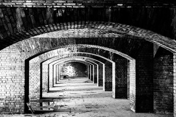 Endless brick passage with repeating archways in Fort Jefferson on Dry Tortugas National Park.