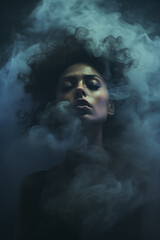 Portrait of a woman fading and dissolving into the smoke dark background. Closed eyes. Praying and supernatural mood. Ghostly. Also related to distant, forsaken, aching, resigned, shunned, yearning