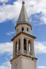 Fototapeta na wymiar Bell tower of St. John the Baptist church (Church Of Saint John), Budva, Montenegro
