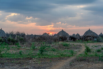 Ethiopia, village of the Nyangatom tribe in the Omo Valley at sunrise.