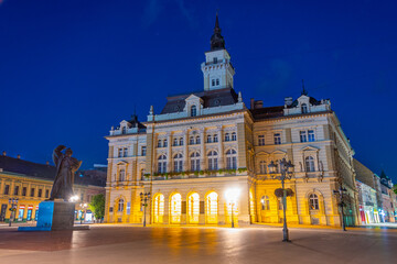 Fototapeta premium Night view of Town hall in the center of Serbian town Novi Sad