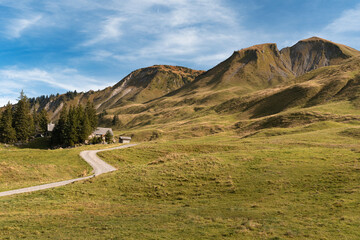 View of a mountain hut and hiking trail in Swiss Alps, Switzerland