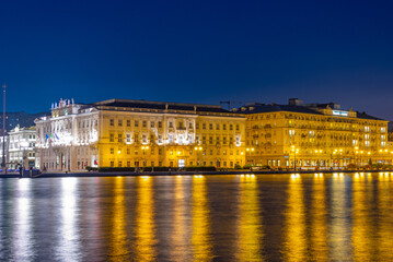 Night view of Savoia Excelsior Palace in Italian town Trieste