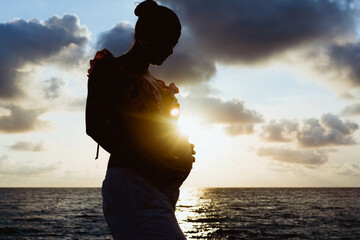 silhouette of a person on the beach