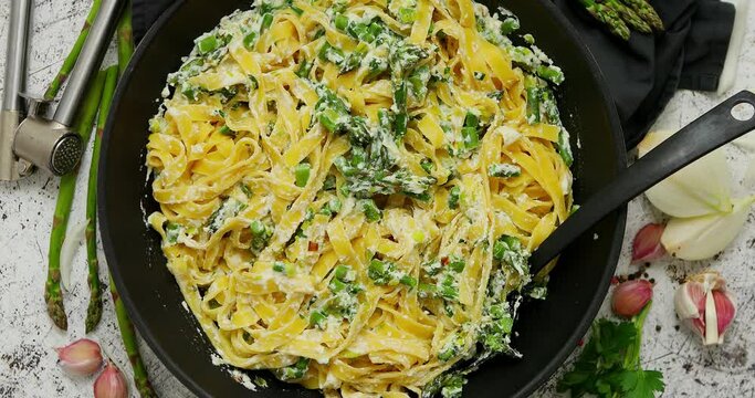 Creamy Fettuccine Pasta with Asparagus in Pan