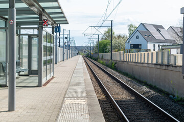 Fototapeta premium railway station in the city,stop at the railway station, railway traction, traveling, station in the city