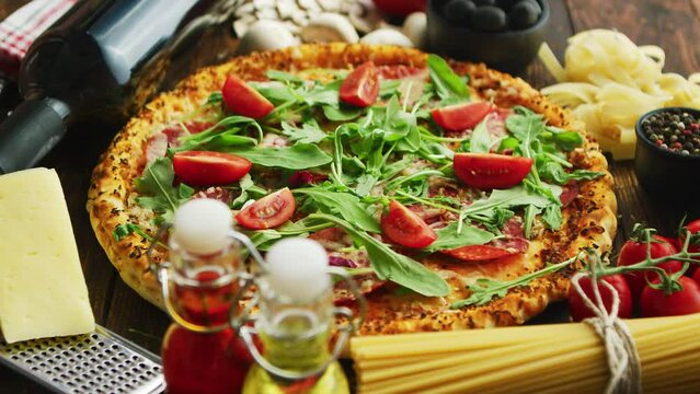 Delicious Homemade Pizza with Fresh Arugula and Tomatoes