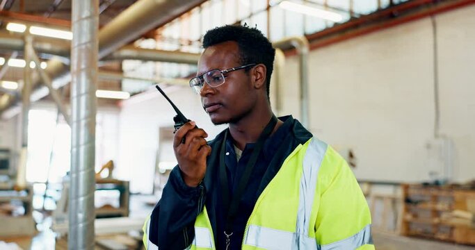 Logistics, black man and radio in factory for communication, delivery or distribution. Carpentry, inspection and male worker with transceiver for woodwork production, manufacturing or restoration
