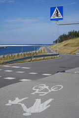 bike path along canal to the Baltic Sea on the Vistula Spit, Pomeranian Voivodship, Poland - 780083889