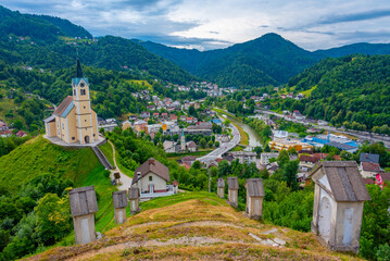 Fototapeta premium Church of Saint Anthony and panorama of Slovenian town Idrija