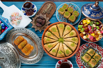 Traditional Turkish Sherbet Desserts (Baklava, Tulumba, Havuç Dilim)and Turkish Tea  Photo,...