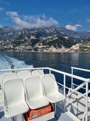 Amalfi panorama. Picturesque historic village on the famous Amalfi Coast in Campania Italy, world heritage area with colorful houses built on the coastline seen from tourist ferry.
- 780104606