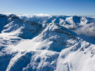 Fototapeta na wymiar Amazing Aerial Winter view of Rila mountain near Musala peak, Bulgaria