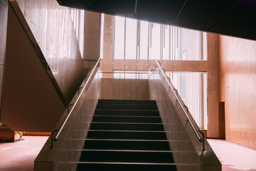 Walls, deserted corridors, windows and stairs of a research institute, industrial building, university.