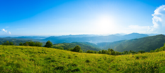 Carpathians mountains landscapes from green meadow on sunset, Apetska mountain, Ukraine