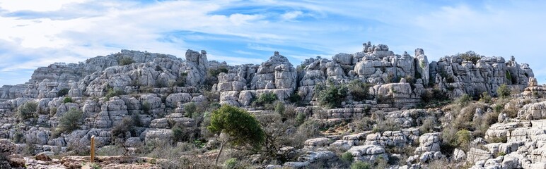 Hiking in the Torcal de Antequerra National Park, limestone rock formations and known for unusual...