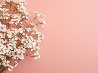 Admire the elegance of gypsophila flowers showcased in a flat lay style on turquoise