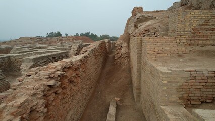 Ancient brick ruins under cloudy sky Mohenjo Daro
