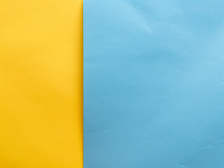 Blue and yellow pastel paper provides a soft background