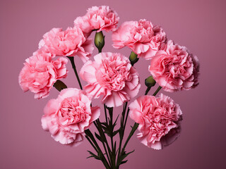 Soft hues and blurred style characterize the background of a carnation bouquet