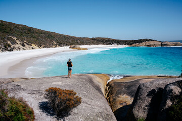 Woman tourist at Little Beach in Two People’s Bay in Western Australia