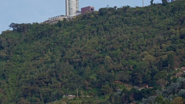 Panning view of Humboldt Hotel and the Avila National Park at Galipan. Caracas, Venezuela