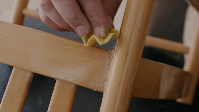 Restoration of a wooden chair. Close-up. Vintage things. High quality 4k footage