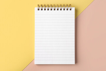 Office notebook on color background