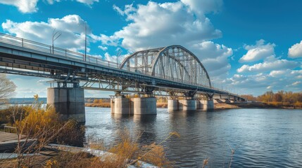 Fototapeta na wymiar Steel and concrete structures A large vehicle bridge crosses the river.