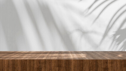Wooden table high quality table top close up with soft palm shadows and sun light, summer background product display - empty copy space for product and design mock up, wooden countertop and white wall