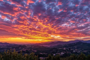 Zelfklevend Fotobehang Vibrant fiery sunset sky with orange, pink, purple and yellow colors, panoramic landscape © Lucija