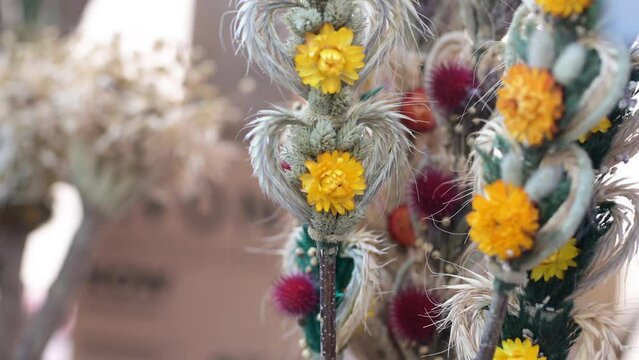Traditional Lithuanian Easter palms known as verbos sold on Kaziukas, Easter market in Vilnius. Lithuanian capital's annual traditional crafts fair is held every March on Old Town streets.
