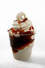 Panoramic still life of ice cream slush frozen colorful frozen fruit granita drinks flowing into takeaway plastic cups with ice cream straws flavor