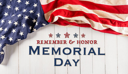 Happy Memorial day concept made from american flag and the text on white wooden background.