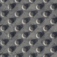 Seamless polka dot pattern. Square fragment of street flooring, plaster bas-relief, concrete stone...