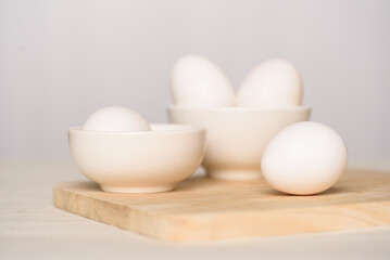 Fresh white organic eggs of the Leghorn breed from local farms raised in an open system....