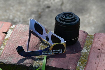 Solar Eclipse Glasses by a Camera Lens