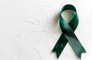 green ribbon with the words 'mental health awareness week', white background. The text is in the style of MSW with a green ribbon displaying the words 'mental health awareness week' 