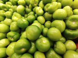 tomatoes in a market, tomates en un mercado

