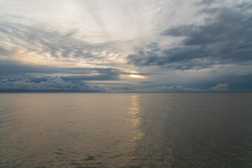 View of the Black Sea on the coast of Sochi against the sunset sky, Sochi, Krasnodar Krai, Russia