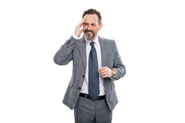 Fototapeta premium Headache and eye strain on laptop. Chronic headache. Migraine from overwork, deadline. Business man in suit with headache. Businessman has stress. Mature businessman in suit isolated on white